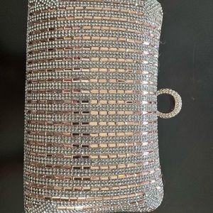 Stunning crystal/rhinestone ring clutch in rose gold and yellow gold.